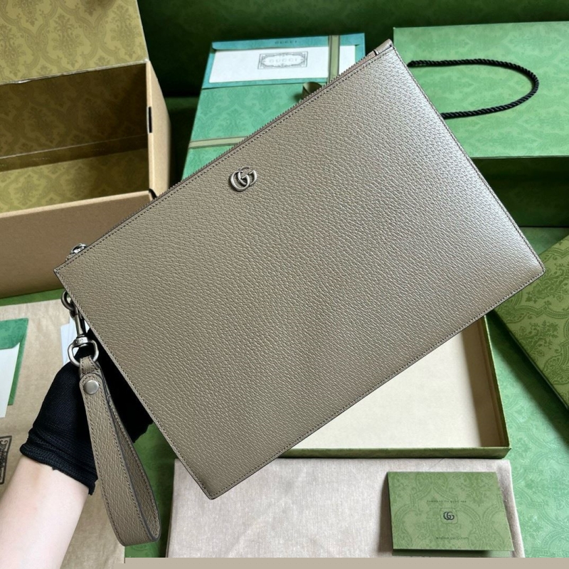 G*u*i clutch bags
